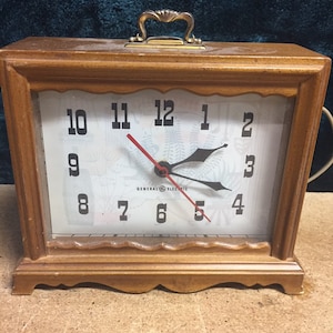 Sunbeam Electric clock model A-300 General Electric mantle clock