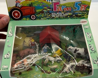 Mego 28 piece farm set with different animals , fences , farm house , tree and people. Made in British colony of Hong Kong