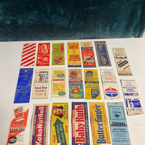 Group of 20 matchbox covers many different styles and advertisements