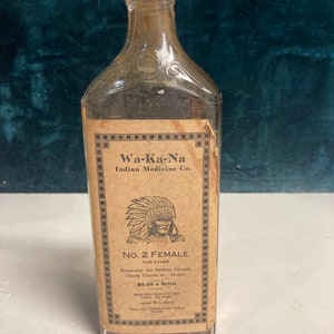 Wa - Ka - Na indian medicine Company medicine bottle Council Bluffs Iowa Number 2 Female