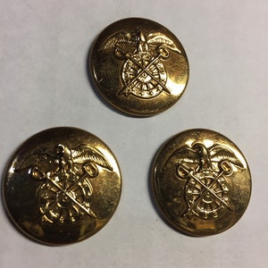 3 US Army World War Two Korea era collar insignias quartermaster department