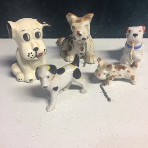 Group of porcelain dog figures made in Japan #2