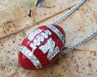 Nebraska Huskers White Gold and Diamond Football Pendant