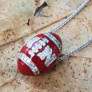 Nebraska Huskers White Gold and Diamond Football Pendant image 1