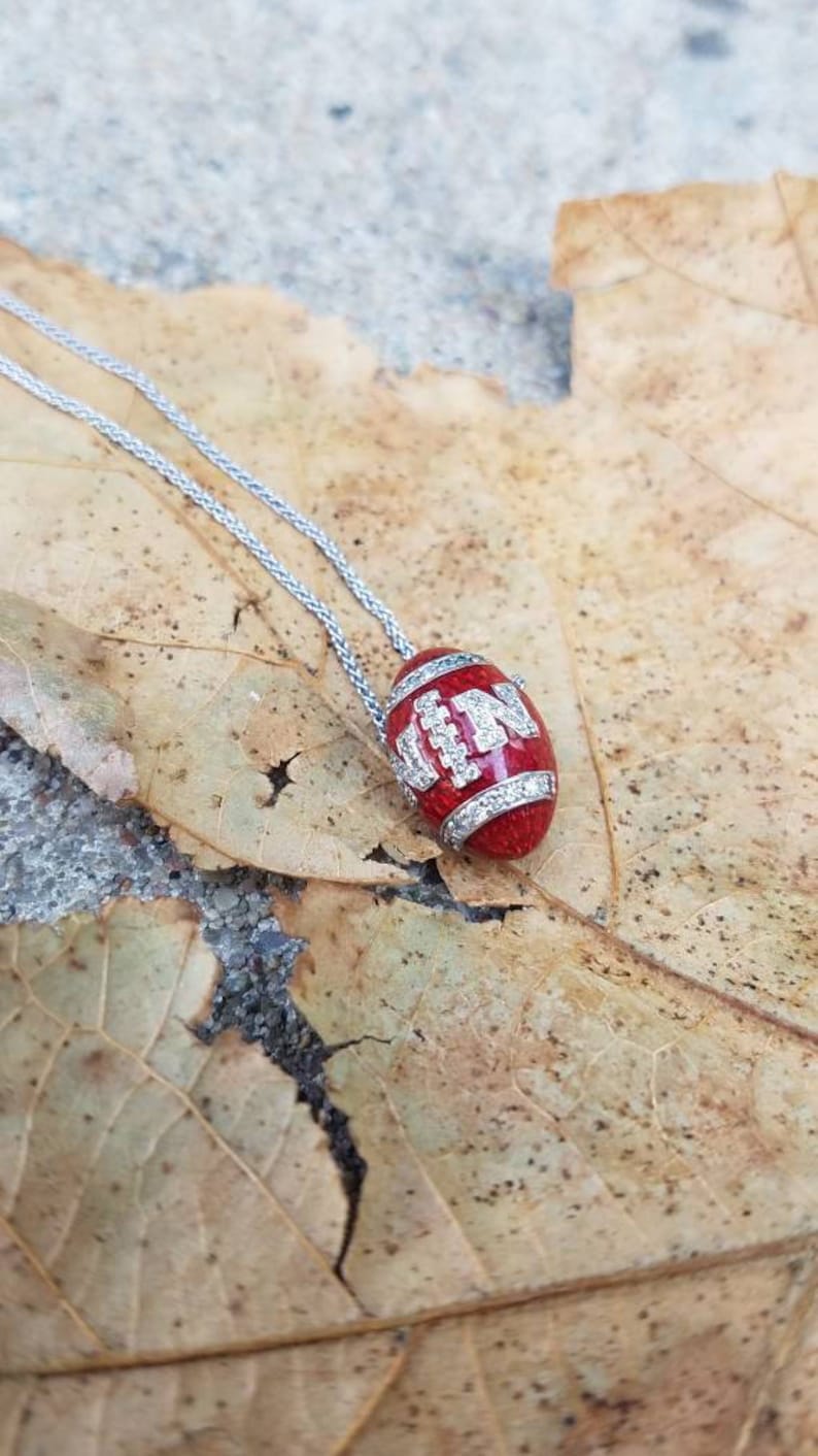 Nebraska Huskers White Gold and Diamond Football Pendant image 4