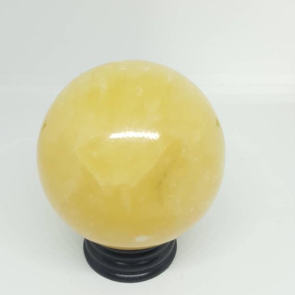 Crystal ball orange calcite, 54 mm,
