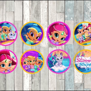 Może przedstawiać: Osiem okrągłych naklejek z postaciami z animowanego serialu telewizyjnego Shimmer and Shine. Naklejki przedstawiają postacie Shimmer i Shine, ich domowe dżiny i tekst "Shimmer and Shine".