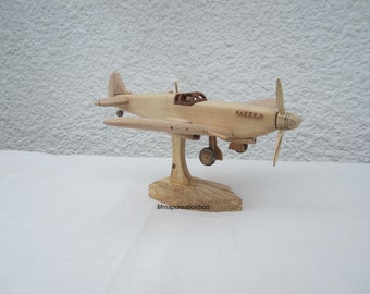 Wooden miniature of a Spitfire Mk IX aircraft at 1/32 scale in beech.