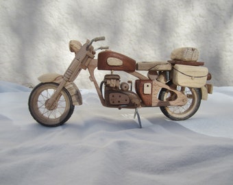 Single-cylinder wooden motorcycle.