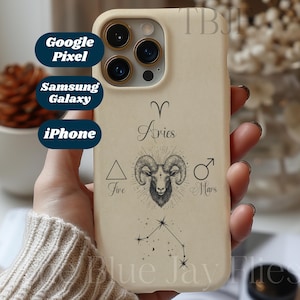 May include: A beige phone case with a white ram illustration and the text "Aries" and "Mars" and "Jove". The phone case has a camera lens cutout and a constellation design.