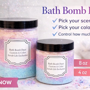 May include: Two clear jars filled with colorful bath bomb dust. The dust is layered with blue, pink, and purple hues. The jars have black lids and labels that read "Bath Bomb Dust Custom & Color Scrub Life Exclusive". The image also includes the text "Pick your scent, Pick your color, Control how much you use".