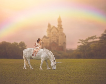 May include: A young girl in a white dress rides a white unicorn in a field with a rainbow in the background. A white castle is visible in the distance.