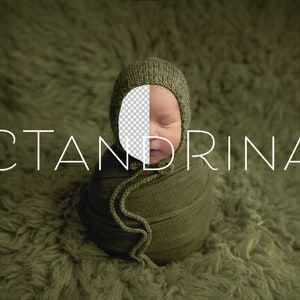 May include: A newborn baby wrapped in a green swaddle and wearing a green knitted hat. The baby's face is partially visible, with eyes closed. The background is a fuzzy green fabric.