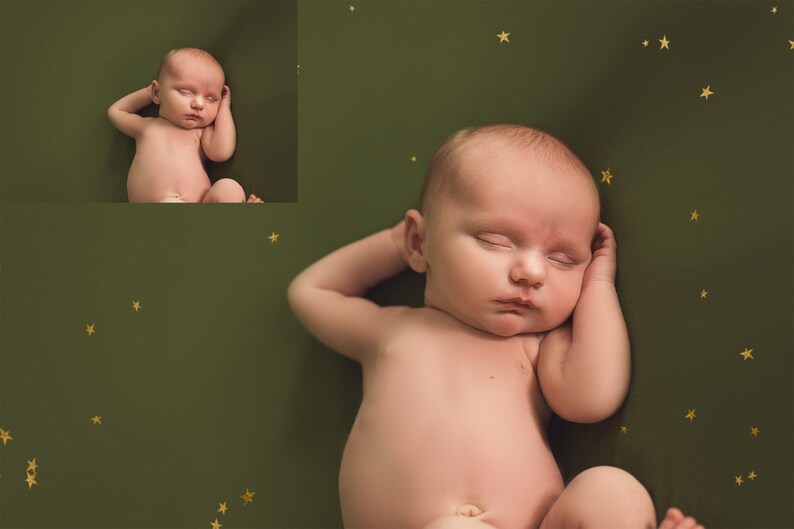 May include: A newborn baby sleeping on a green background with gold stars. The baby is lying on its back with its arms crossed over its chest and its head resting on its arm.