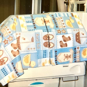 Cute double-sided fleece cover for Giraffe incubators in NICU's to provide womb-like environment for growing premature infants.