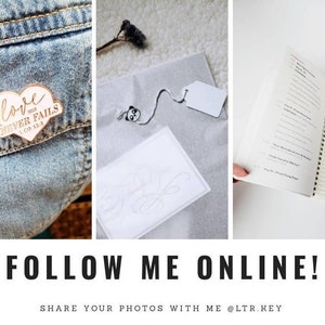 May include: A collage of three images. The first image shows a denim jacket with a wooden heart-shaped pin that says "love never fails 1 Co 13:8". The second image shows a white card with a handwritten design on it. The third image shows a notebook with a white cover and lined pages.