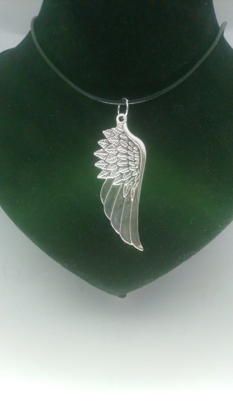 Angel wing necklace on 22 inch leather cord
