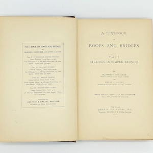 May include: A book titled "Text Book on Roofs and Bridges" by Mansfield Merriman and Henry S. Jacoby. The book is a sixth edition, rewritten and enlarged. It was published by John Wiley & Sons, Inc. in New York in 1924.