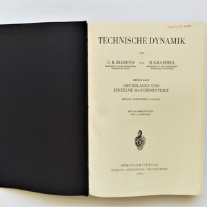 May include: A book titled "Technische Dynamik" by C.B. Biezeno and R. Grammel. The book is a second edition and includes illustrations and appendices.