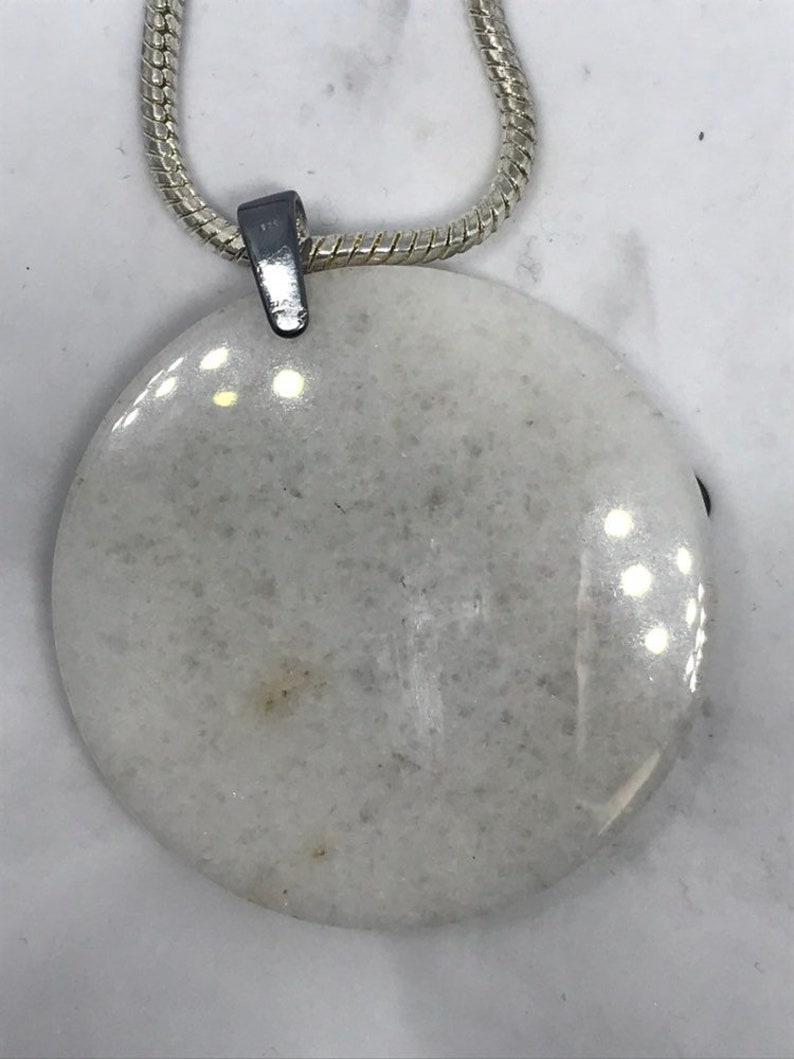 Lapis Lazuli on a White Jade disc 0294