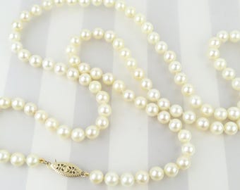 Natural Akoya golden hue 6.5 mm pearls 31 inch long matinee necklace 14k yellow gold clasp