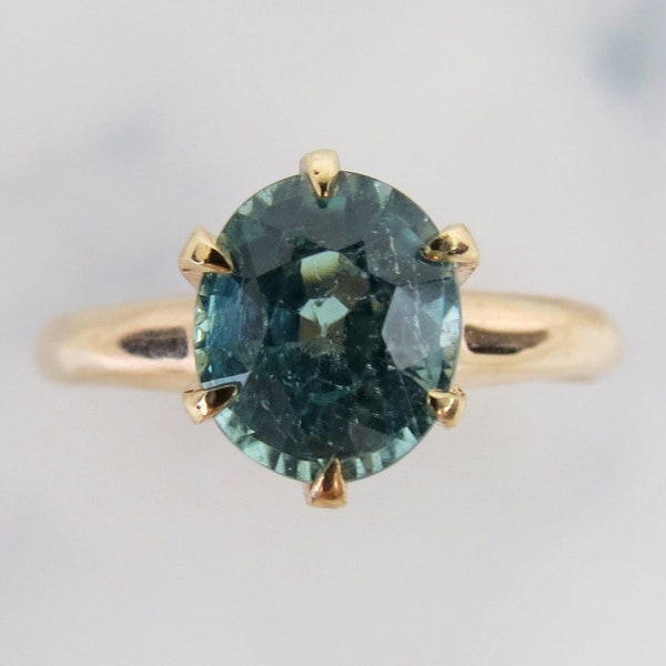 Sparkling sea blue green 2 carat fancy faceted tourmaline set in 10k yellow gold Ostby & Barton solitaire ring size 7