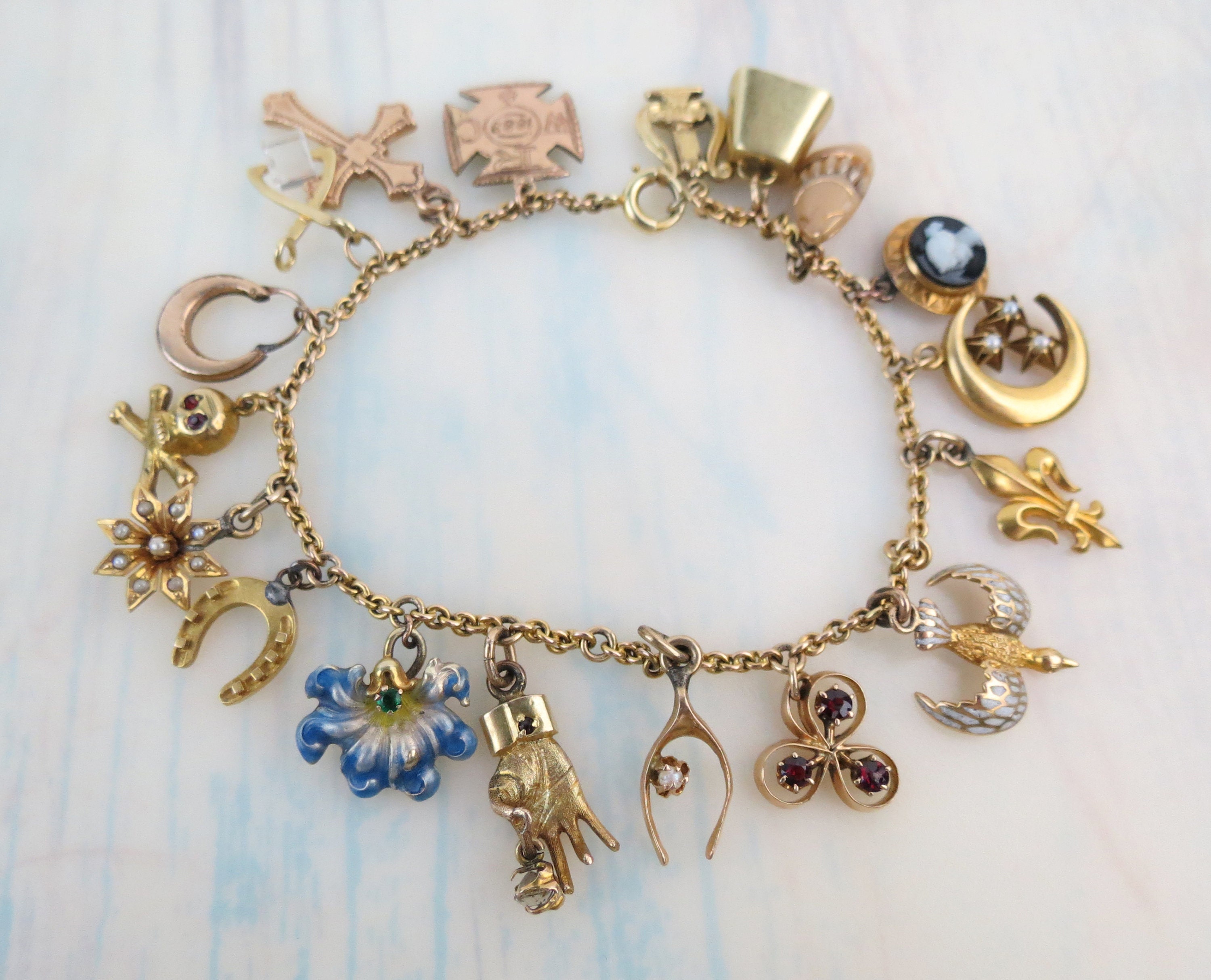 Charms - AJU  Gold charm bracelet, Vintage charm bracelet, Charm