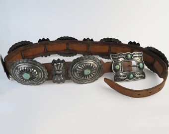 Compelling vintage 1940s era large heavy Navajo sterling silver turquoise concho belt