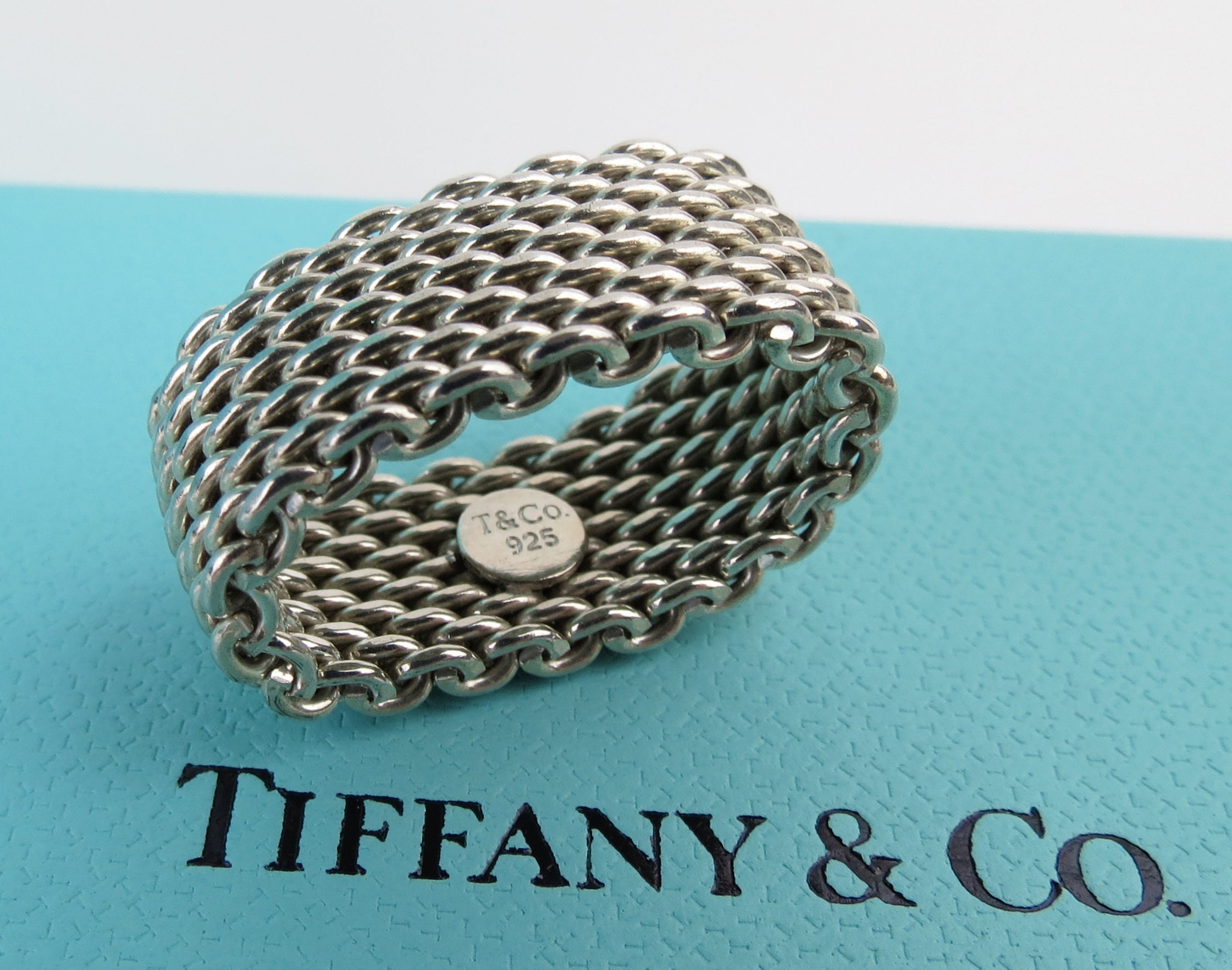 Sold at Auction: TIFFANY & CO. STERLING MESH RING, 4.75.