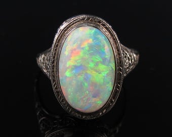 Vintage 14k white gold filigree ring size 7.25 with a bright Australian opal cabochon