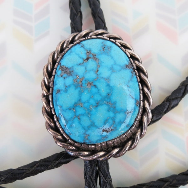 Vintage oval braided sterling bezel sky blue turquoise fine and clean sterling silver native American signed RMJ bolo tie