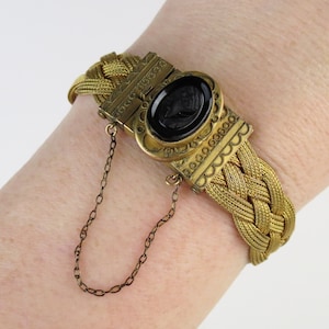 Antique 12k gold filled woven mesh wrap bracelet with onyx cameo profile center clasp signed E