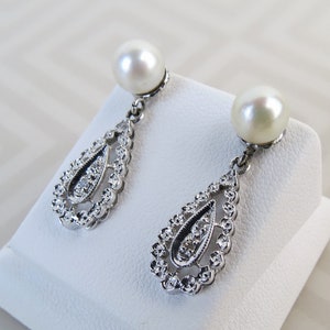 14k White gold 7mm natural pearl pear shaped dangle post diamond accent earrings