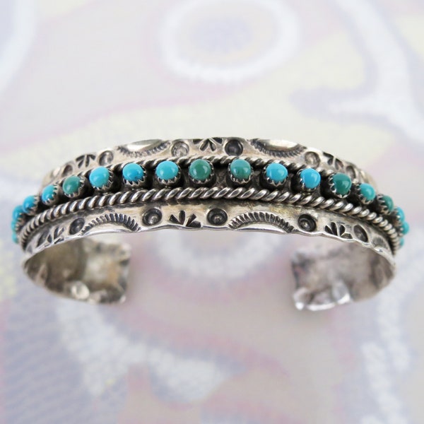 Vintage Zuni native American sterling silver turquoise single row petite point cuff bracelet by Jason & Pearl Ukestine