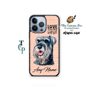 Könnte beinhalten: Eine rosa und weiße Handyhülle mit schwarzem Rand. Die Hülle zeigt eine niedliche Illustration eines Zwergschnauzers mit dem Text "LOVE IS A FOUR LEGGED WORD" und dem Text "Any Name" unten.