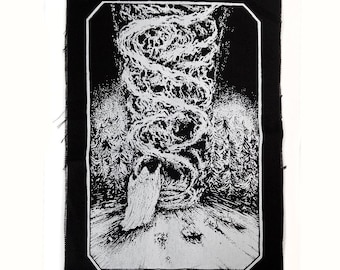 May include: Black and white embroidered patch with a swirling design and a figure in a hooded robe. The patch is surrounded by a black border.