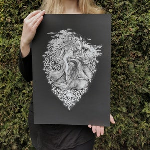 May include: A black and white print of a woman in a flowing gown with a crown on her head. The woman is standing in a cloud-like background with a decorative border around her.