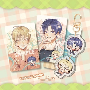 May include: A collection of anime-style merchandise featuring male characters. Includes two rectangular cards with illustrations and the word "SAMPLE", and a keychain with two acrylic charms. The text "LINKING CHARM" is also visible.