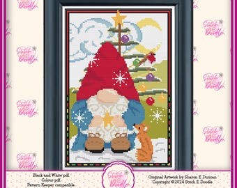 May include: A cross-stitch pattern featuring a gnome with a large red hat and blue coat, standing in snow next to a small orange fox. Behind them is a decorated Christmas tree with ornaments, a yellow star, and a crescent moon in the sky.