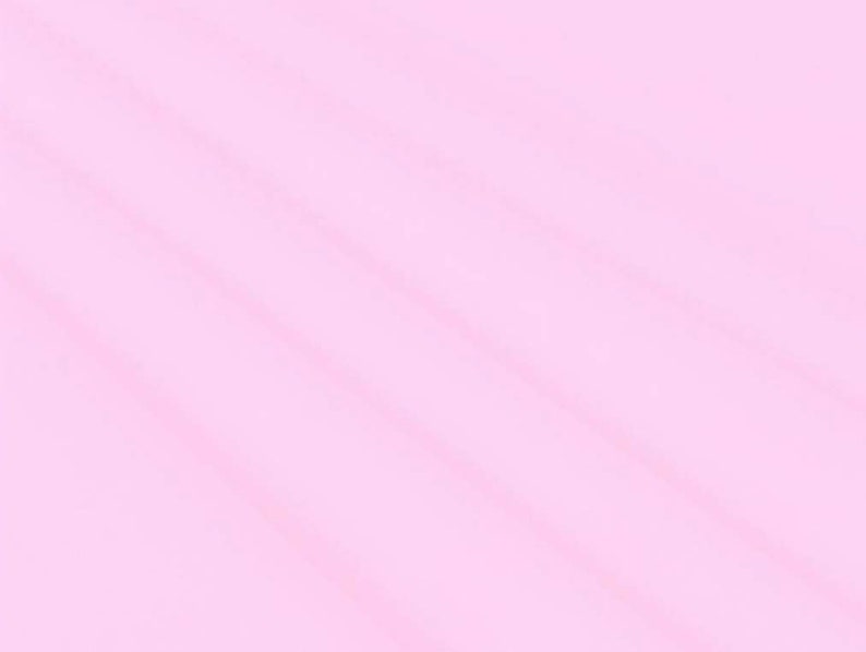 May include: A soft, light pink background with subtle diagonal lines creating a textured effect.