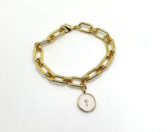 Pulsera de eslabones dorados y dije de cruz