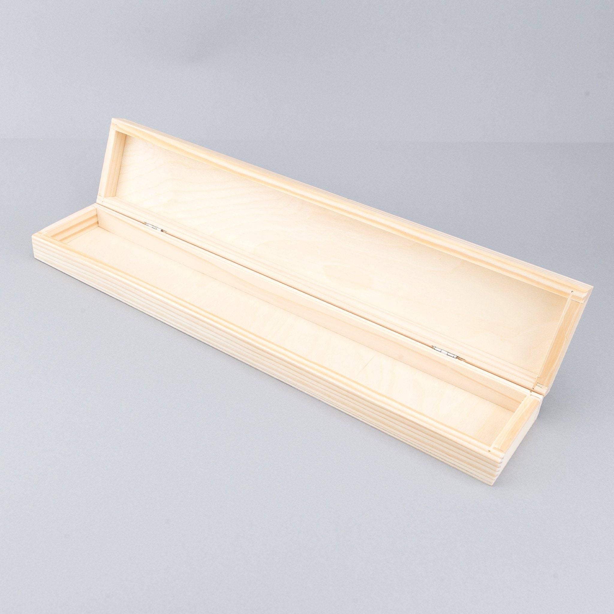 Vintage wooden knitting needle storage box with sliding lid