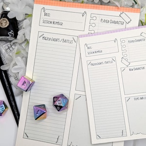 May include: White paper sheets with lined sections for notes, labelled "Date", "Session Number", "Player Character", "Major Events/Battles", "New Characters", and "Items and Loot". Iridescent dice and a black ink pen are also visible.