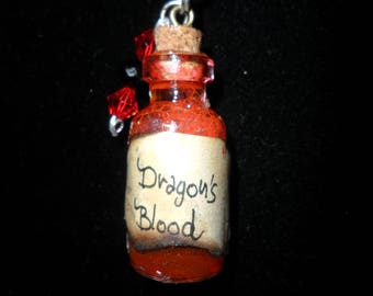 Pendant with glass flask "Dragonblood"