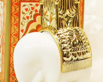 Avon discontinued white milk glass Elephant Filled with Charisma Cologne fragrance Full 1.5 fl oz Unused / New Condition - Box too! perfume