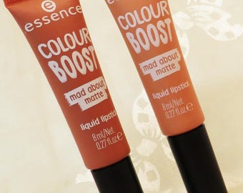 Lot of 2 Liquid Lipstick Soft Pink-03 Wanna Play? and Soft Peach-02 shades Essence Full size 0.27 oz. each Built-in Sponge tip applicators