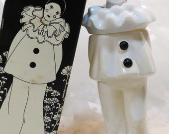 Avon White Clown w/2 Black Buttons Charisma Cologne fragrance 90% full Shiny Painted bottle over clear heavy-gauge glass In Collectible Book