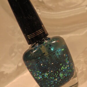 Lot of 2! Milani green-blue glitter Nail polish enamel Lacquer .45 oz. each Full size Only 50 cents more to ship 2nd makeup item!