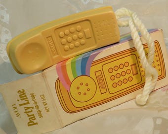 Avon Push button Phone Telephone Yellow Soap-on-a-Rope Large 5 oz. 4-3/4" Mint condition In Collectible Encyclopedia Delightfully Scented