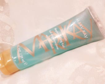 Mary Kay suncare After-Sun Replenishing Gel travel size 1 fl oz Flip-top cap Contains soothing botanical extracts Ultra-light cool, blue gel